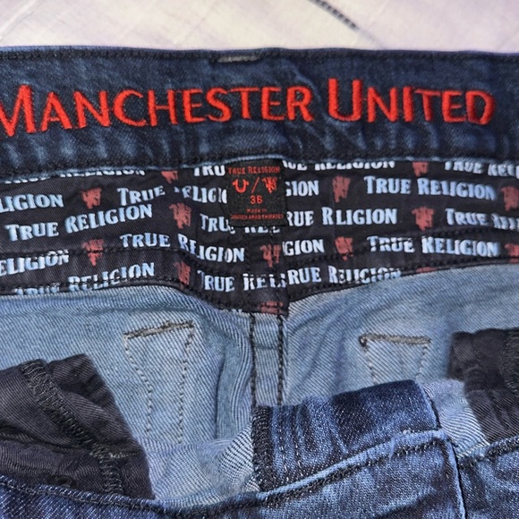 True Religion Men’s Rocco Manchester United. Dark Blue denim with red tags. - Picture 4 of 10
